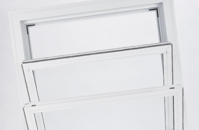 Secondary glazing unit in vertical sliding configuration